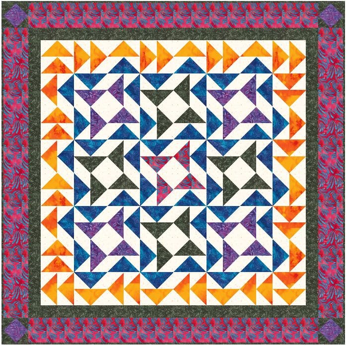 A quilt with a lot of movement made by flying geese blocks