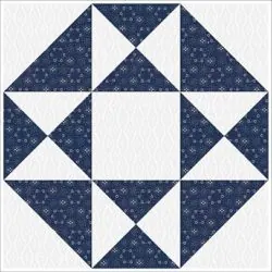 Dark blue and white quilt block with geometric star and diamond patterns, perfect for crafting, quilting, and sewing projects.