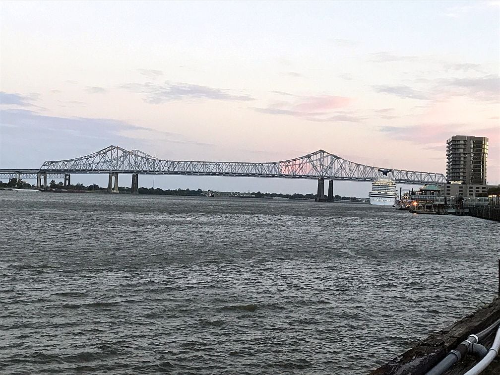 Bridge in New Orleans showing a cruise ship at a dock