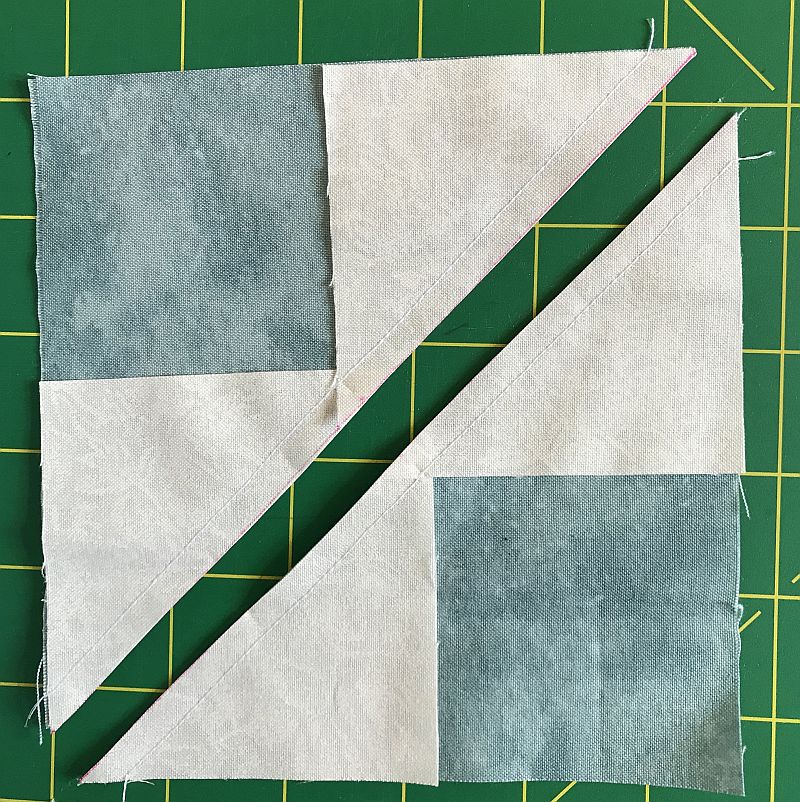 Picture showing the second step in making Flying Geese blocks using the Wing Clipper or No Math ruler.