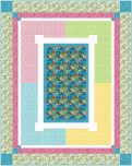 This happy quilt features your favorite fabric or panel in the center and surrounds it with pretty fabrics to grow your garden. Ideal for beginners. Gather your pretty floral fabrics and have a party! Finishes approx 69" x 87".