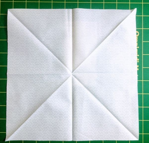Picture of a quilt block being prepared for cutting
