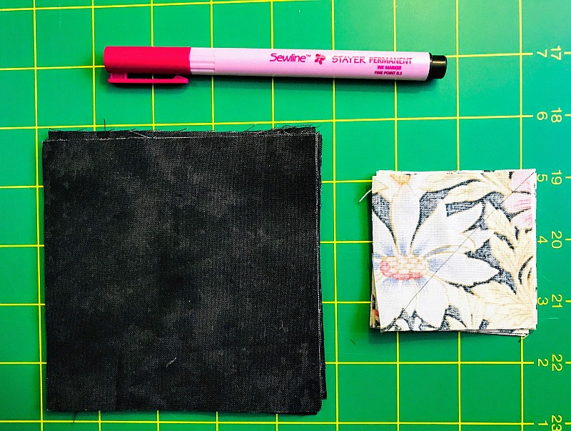 Two quilt blocks and a Permanent Pen