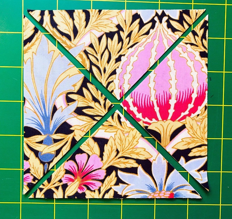 Cutting a quilt square on both diagonals