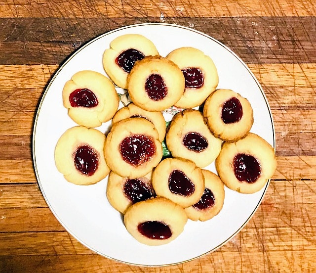 Grandma Werge's Thumbprint Cookies on a Christmas plate