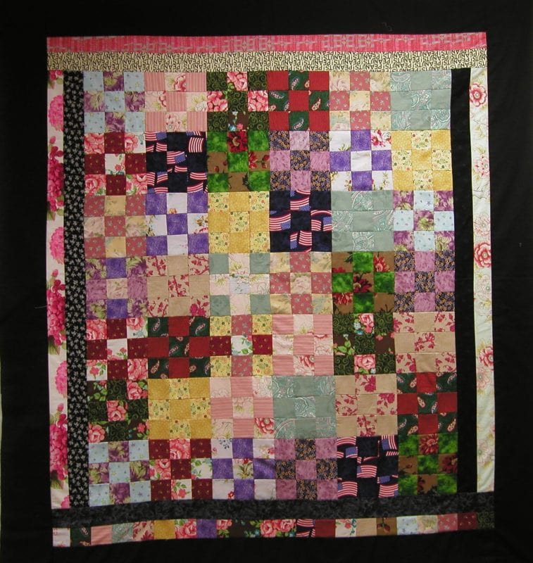 Nine Patch Quilt made with a jelly roll