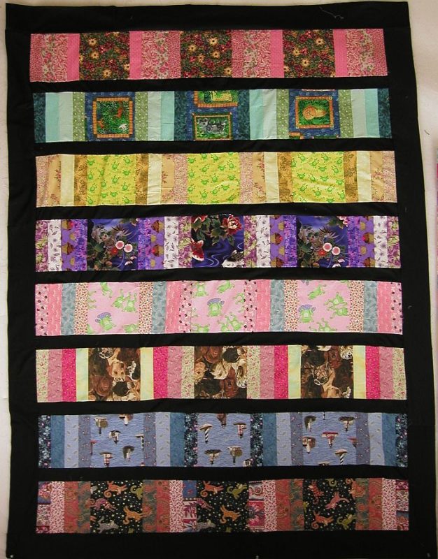 Coin Quilt made from jelly roll scraps