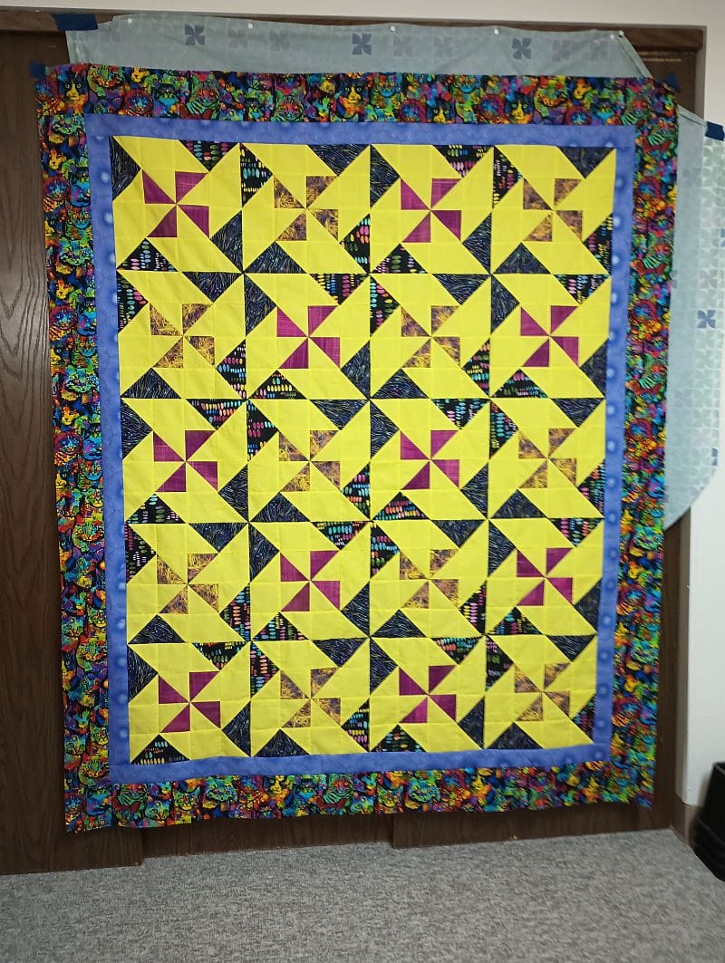 Finished Mardi Gras Magic Quilt by Kathryn