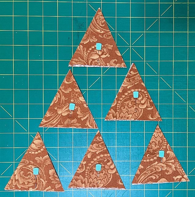 Stained glass quilt block, fabric patchwork, sewing project materials, patchwork fabric for quilting, Scrapdash quilt supplies, craft fabric for quilting, decorative fabric piece for quilt, textile patchwork for sewing, quilting fabric art, sewing and quilting materials.