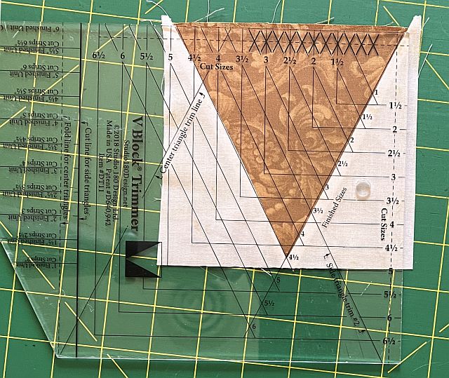 Stained glass quilt block, fabric patchwork, sewing project materials, patchwork fabric for quilting, Scrapdash quilt supplies, craft fabric for quilting, decorative fabric piece for quilt, textile patchwork for sewing, quilting fabric art, sewing and quilting materials.