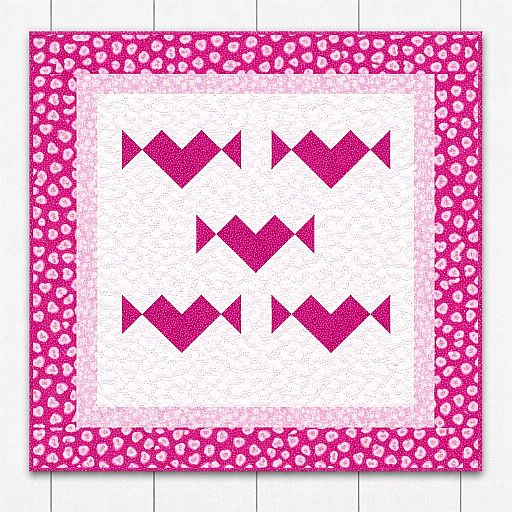 Hearts-and-Candy-Doll-Quilt A quilt with a pink and white design features three rows of geometric fish shapes in dark pink, surrounded by a light pink border and a wider, patterned pink border with white spots.