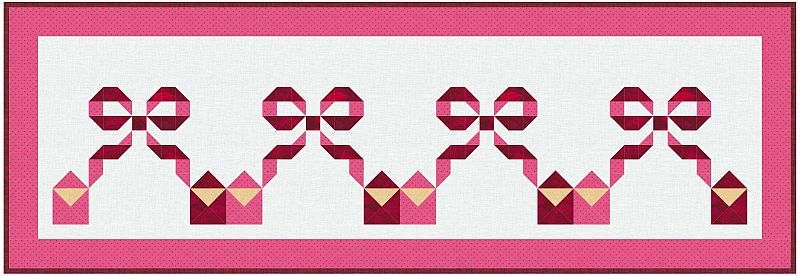 Love-Letters-TR A rectangular quilted table runner with a white background, featuring a repeating pattern of pink crowns and bows, bordered by two shades of pink.