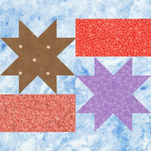 A QuiltBlockMania design, this quilt block features a blue marbled background with two eight-pointed stars—one brown and one purple—and two red rectangular patches with unique textures.